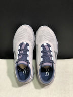 Top view of the On Cloud X sneakers with patterned laces and branded insoles