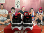 Rear view of white, red, and black Nike basketball shoes with speckled midsoles