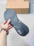 Close view of the patterned outsole and dark gray rubber tread.