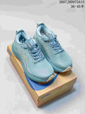 Pair of blue-teal ASICS Gel-Kayano 33 sneakers displayed on an ASICS shoe box.
