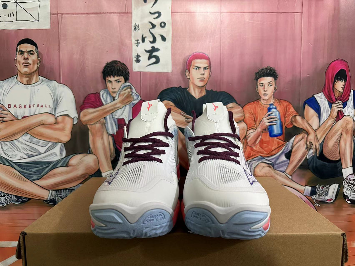 Front view of white Mizuno Wave Momentum 3 shoes with dark purple laces and blue-gray outsole details.