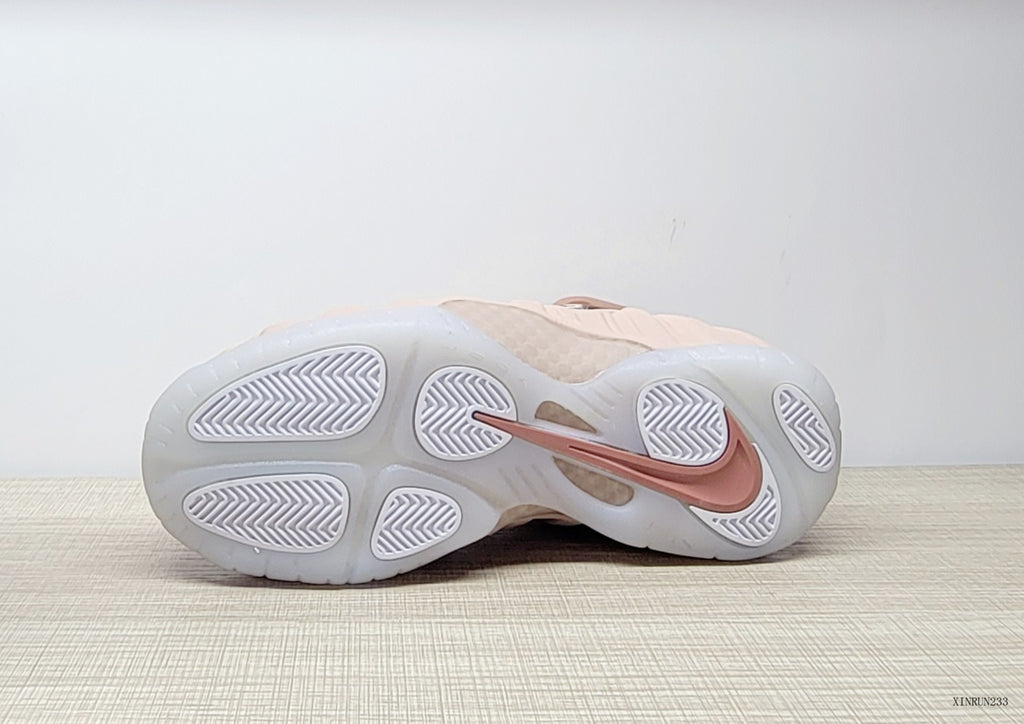 Underside view showing the pale outsole and patterned traction sections