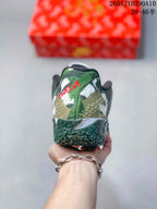 Rear view showing the camouflage-style heel and red TW[EAVE] lettering.