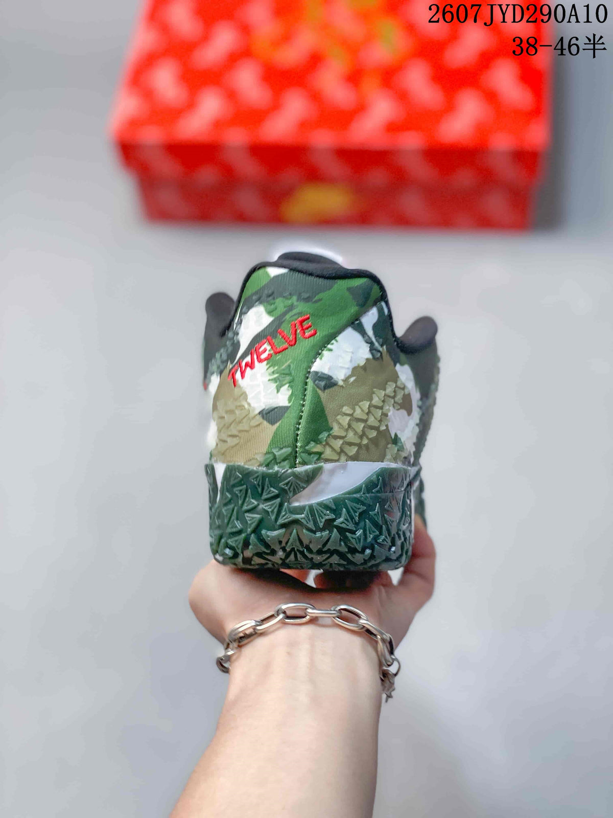 Rear view showing the camouflage-style heel and red TW[EAVE] lettering.