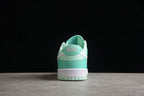 Rear view of one sneaker showing the Nike heel branding, layered heel panels, and mint green outsole.