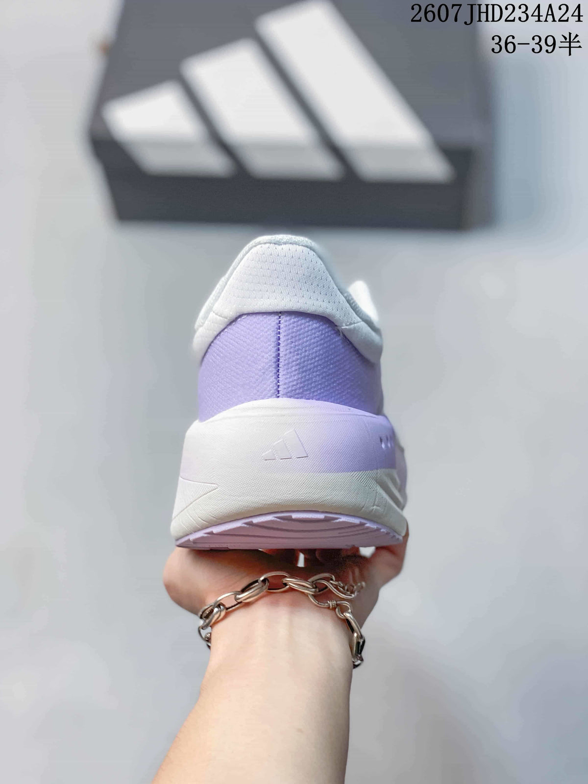 Rear view showing the padded heel, lavender heel panel, and white midsole.