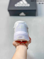 Rear view of the white adidas training shoe showing the padded heel collar and heel detail.