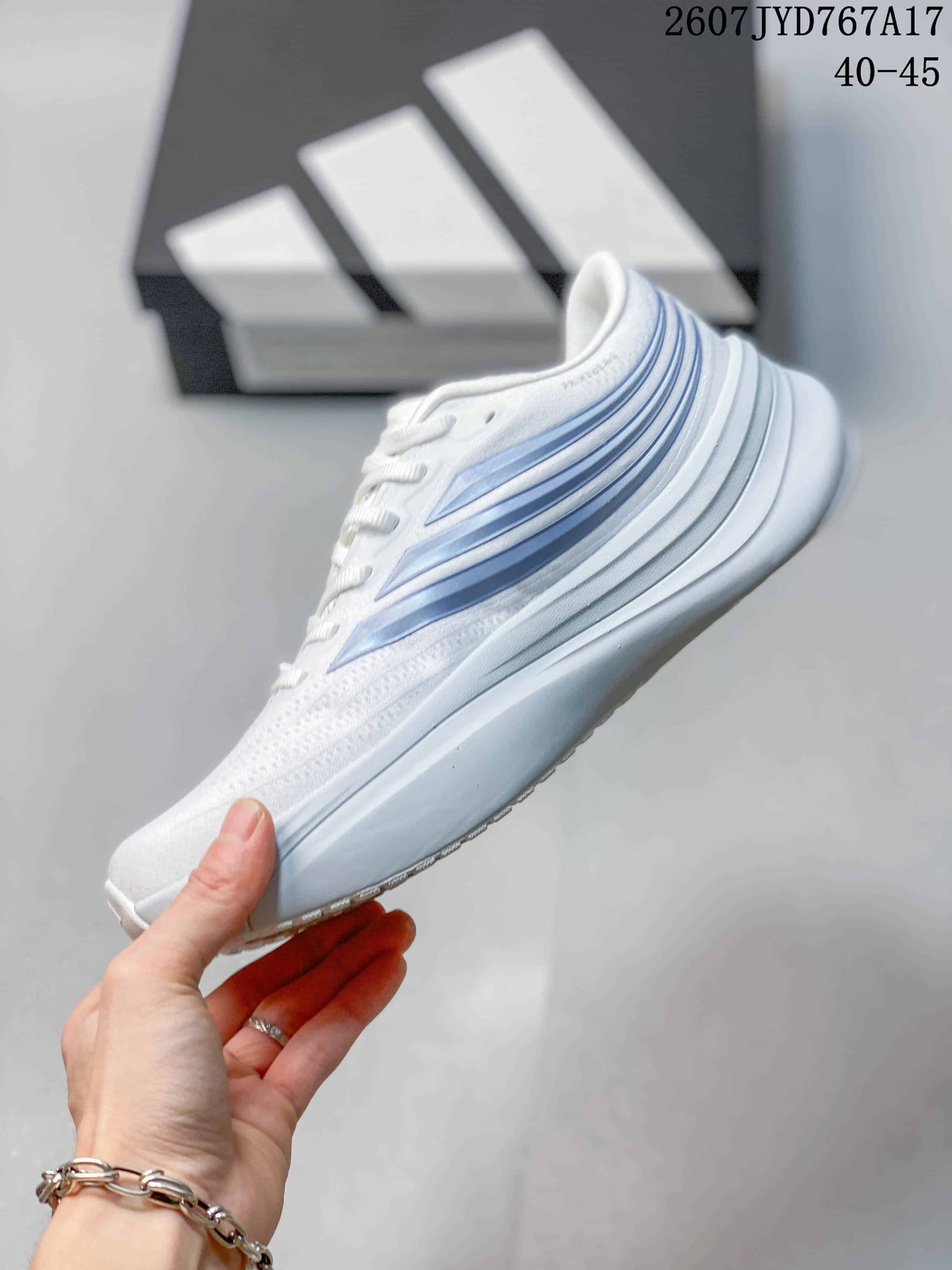 Side view of the white and blue sneaker showing layered side detailing and a raised midsole.