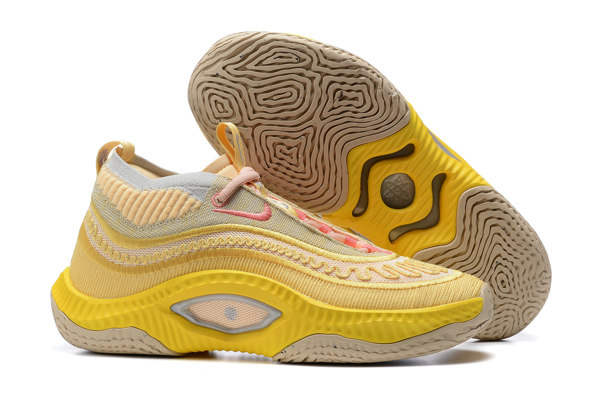 Yellow and cream Nike Anthony Edwards 3 shoes, with outsole view