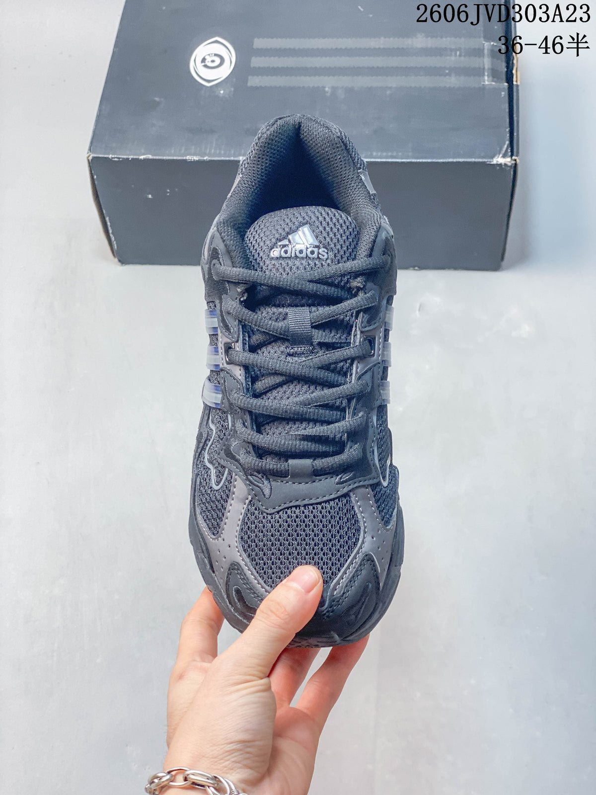 Top view of a grey adidas Response CL sneaker