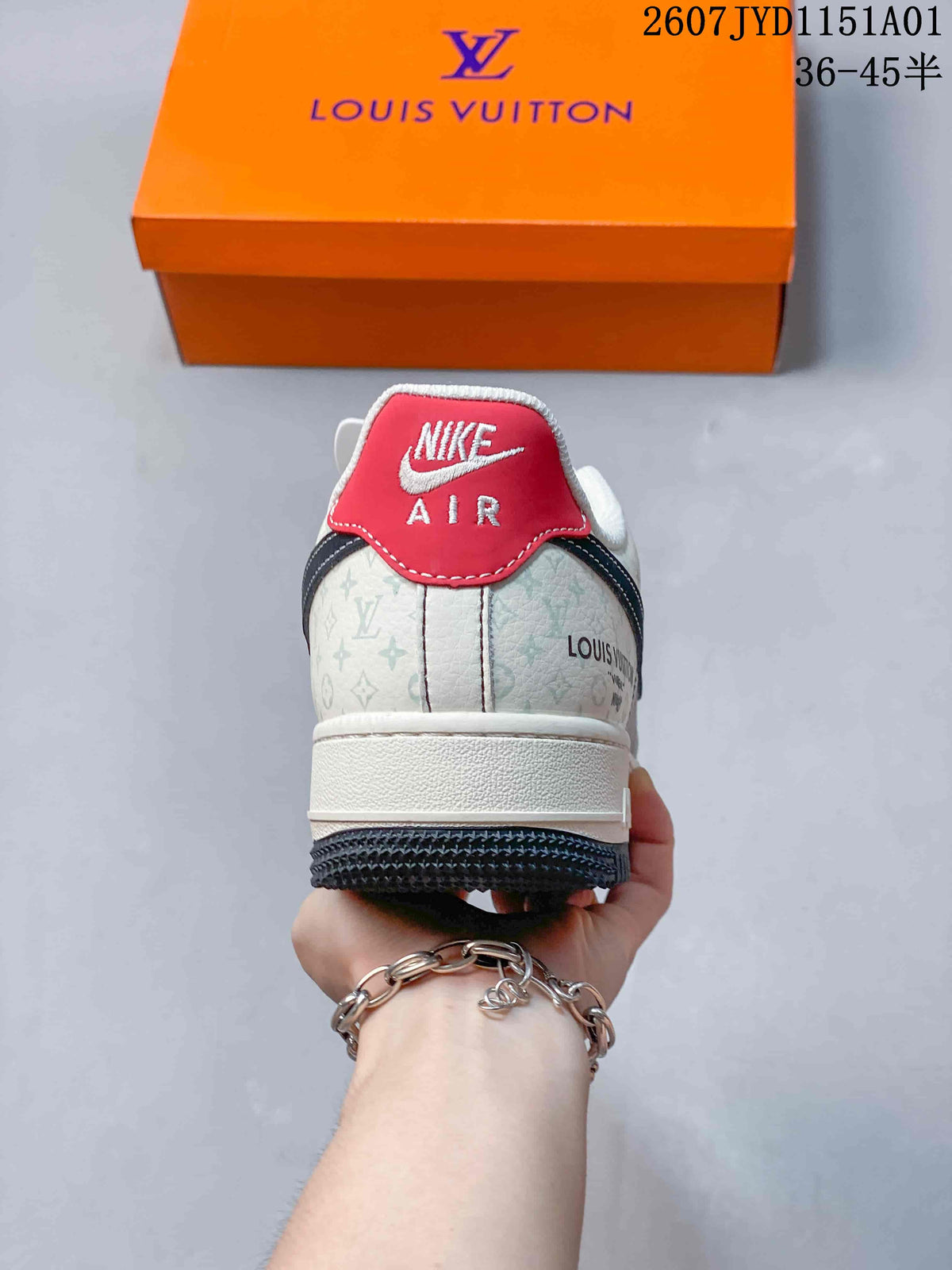 Rear view showing a red heel tab, patterned cream panels, and an orange box.