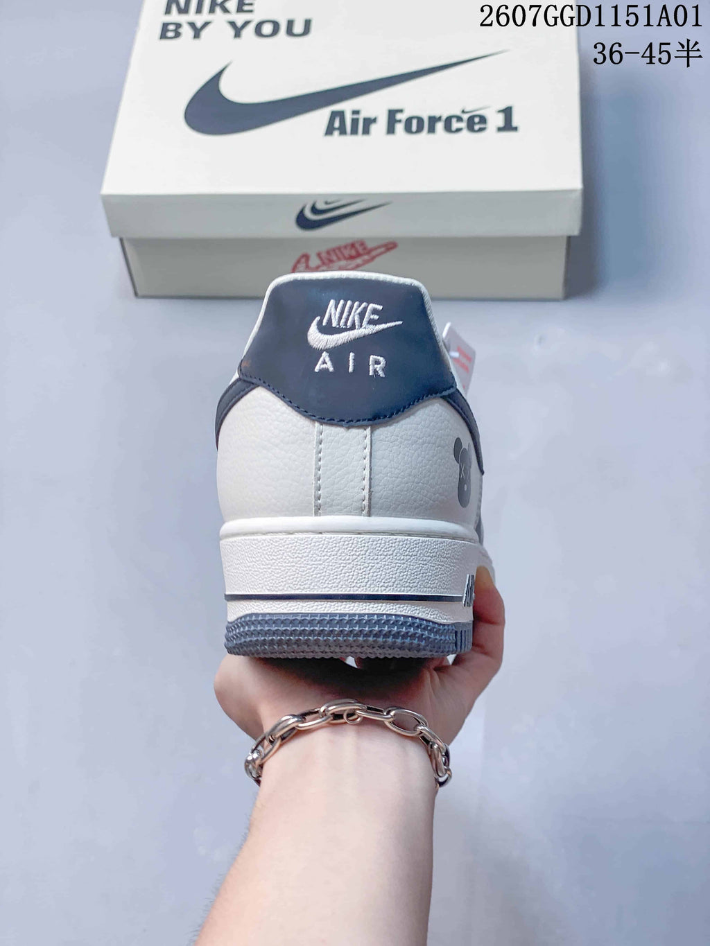 Rear view showing the white heel and blue-gray heel tab