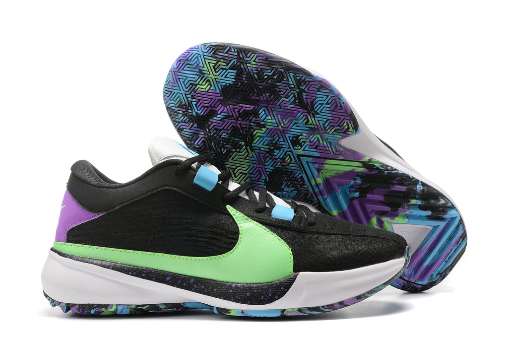 Black basketball shoes with a neon green Swoosh, purple heel accent, and multicolor patterned outsole.