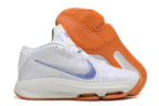 Side view of the white and blue Nike GT Hustle 3 with the outsole visible.