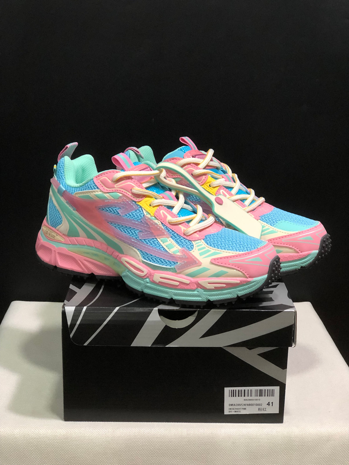 Pair of colorful Off-White Be Right Back sneakers displayed on a branded box, with the box label showing size 41.