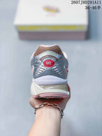 Rear view of an ASICS GEL-NIMBUS 10.1 sneaker showing the GEL heel detail and layered silver upper.