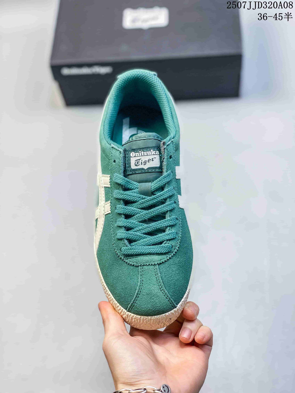 Top view of the green lace-up sneaker with a rounded toe and Onitsuka Tiger tongue label.