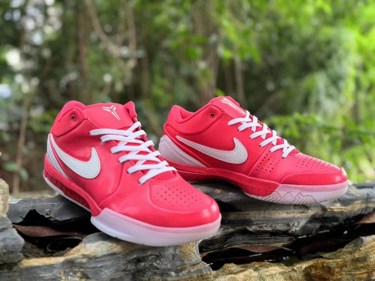 Pink Nike Kobe 4 shoes photographed from front and side angles.