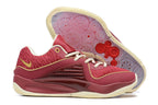 Burgundy Nike KD 16 shoes with cream and gold-colored details and a patterned outsole.