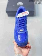 Top view of the blue sneaker showing the perforated toe box, laces and AF1 tongue detail.