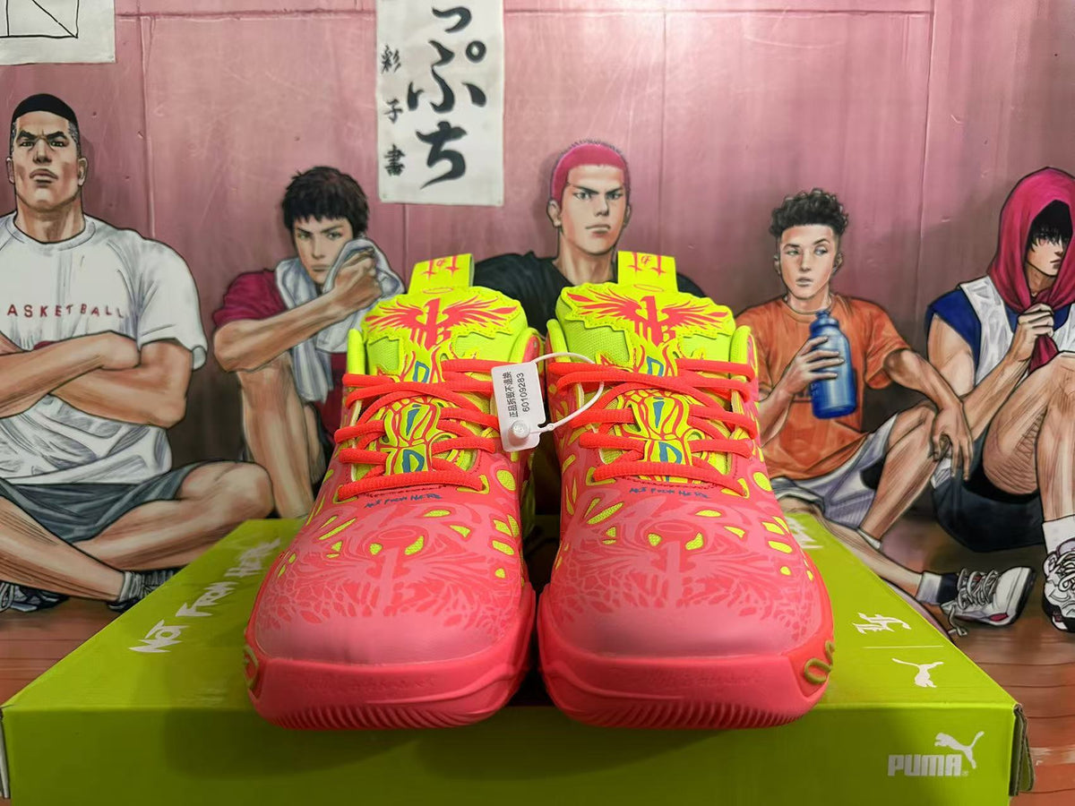 Front view showing coral-colored laces and patterned toes on lime green and coral PUMA sneakers.
