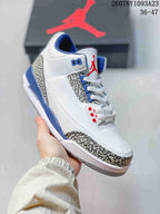 Angled side view of the white high-top sneaker with blue accents, red details, and elephant-print overlays.