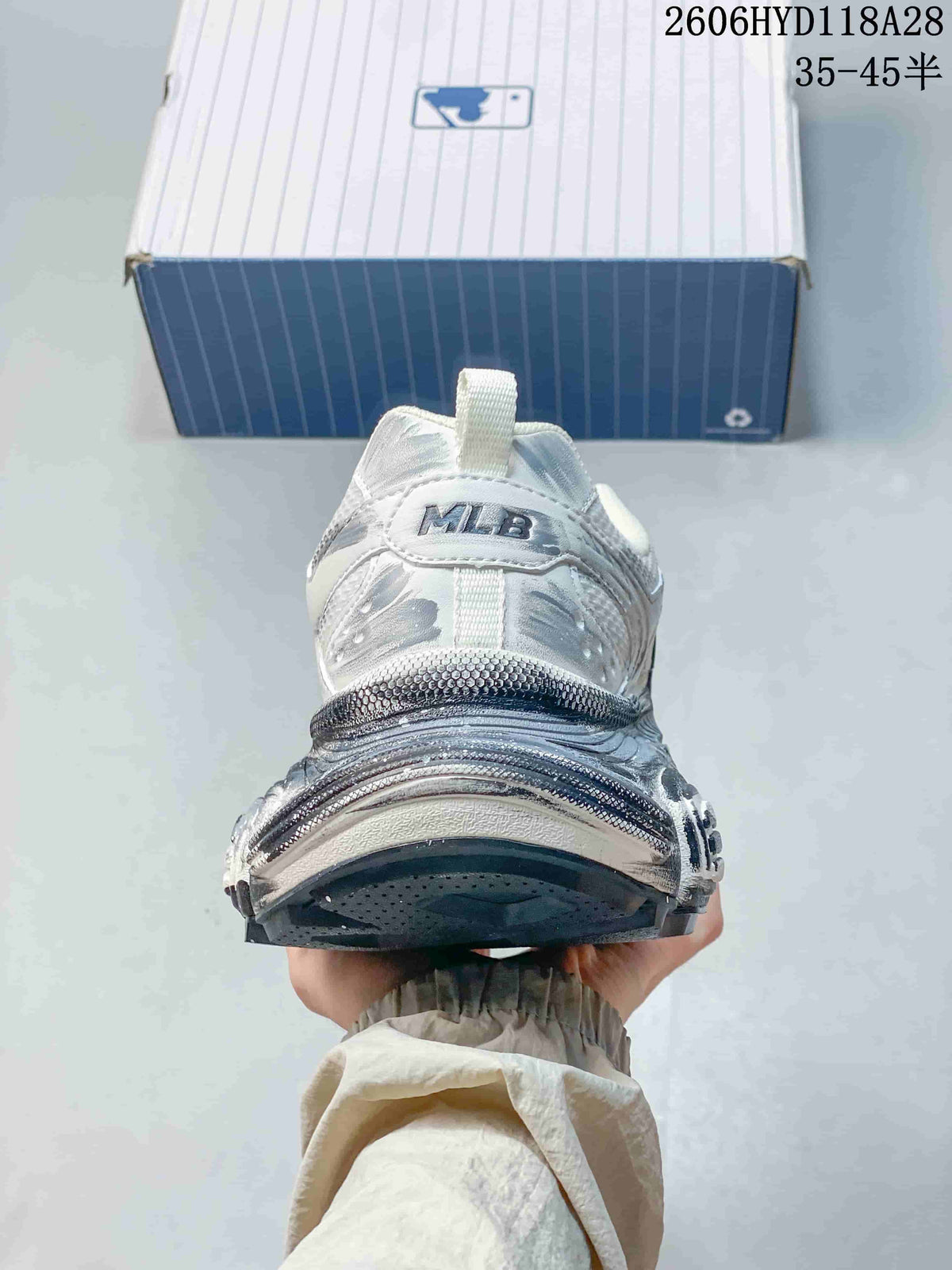 Rear view of the sneaker with MLB lettering on the heel