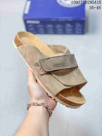 Taupe Boston-style sandal with a matching adjustable strap, open back and cork-look midsole.