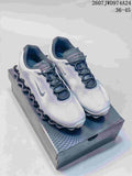 Pair of silver-gray and white Nike Air Liquid Max sneakers displayed on a shoebox; the image shows the listed range 36–45 and style code 2607JWD974A24.