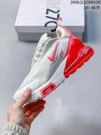 Side view of a white and red Nike Air Max 270 Premium sneaker