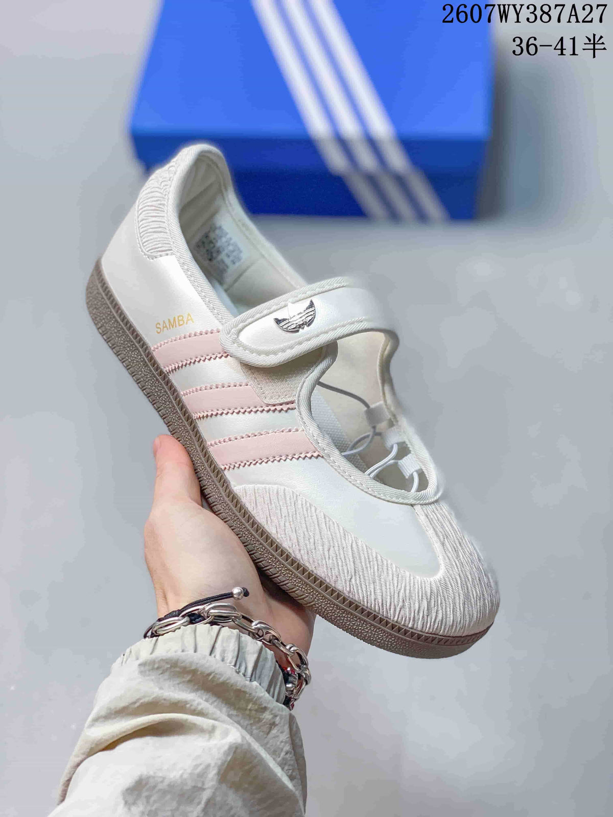 Angled side view of the white and pink sneaker with Mary Jane strap, gum-colored outsole, and visible SAMBA branding.