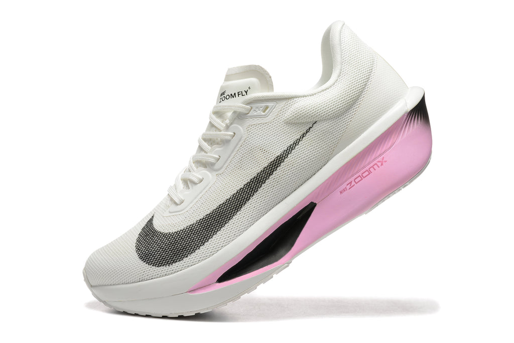 Close view of a white Nike Zoom Fly 6 shoe with pink midsole accents