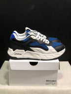 Side profile of a black, blue, and white sneaker pair with white midsoles and Off-White branding on the side.