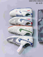 Four photographed sneaker color combinations arranged side by side, including gray, blue, green, and graphic-accented versions.
