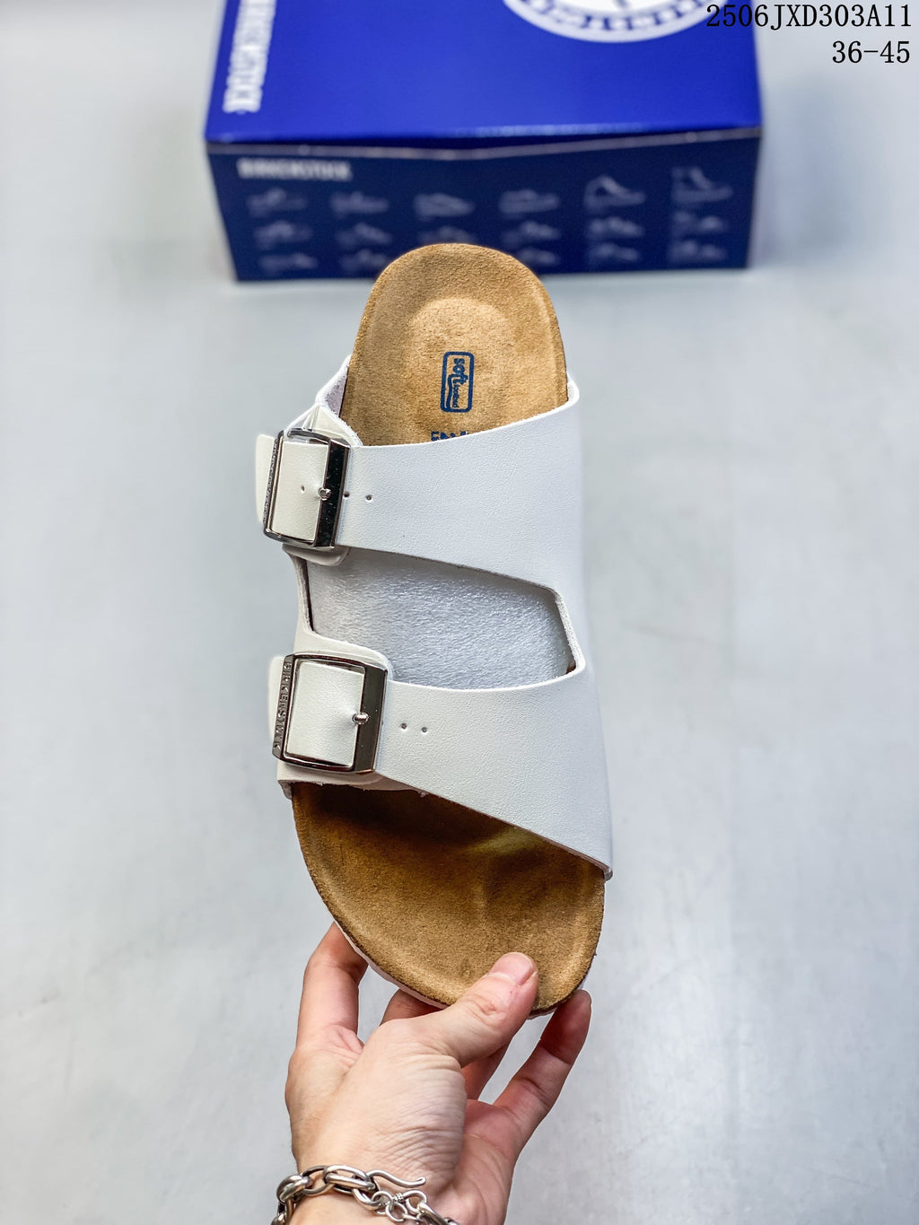 Top view of a white sandal with two adjustable buckles