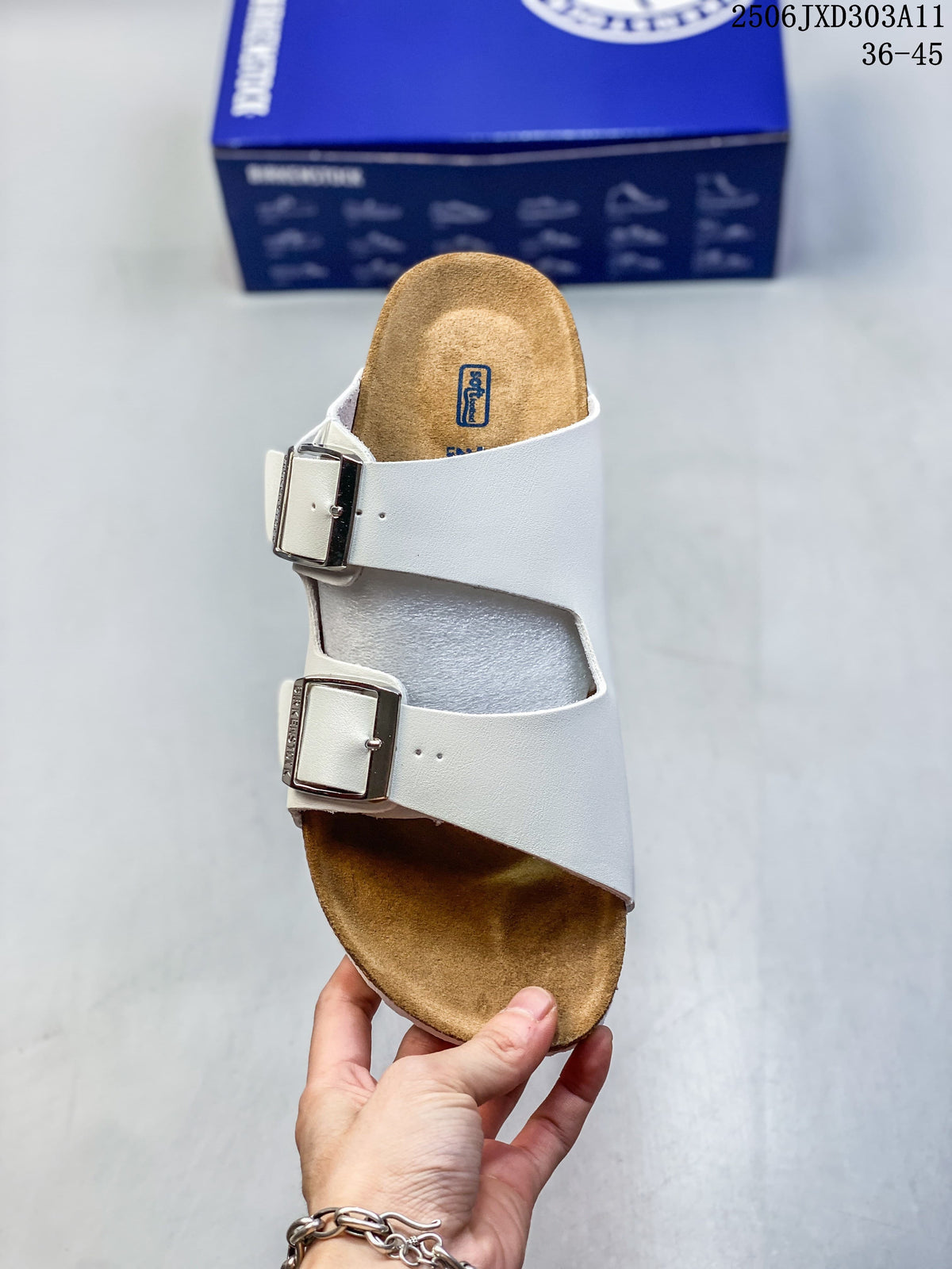 Top view of a white sandal with two adjustable buckles