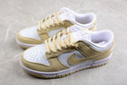 Top three-quarter view of the pair showing cream laces, white toe boxes, and side Swooshes.