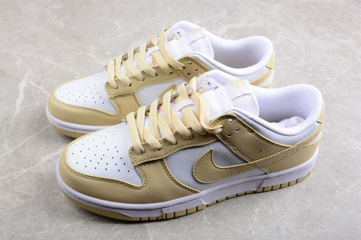 Top three-quarter view of the pair showing cream laces, white toe boxes, and side Swooshes.