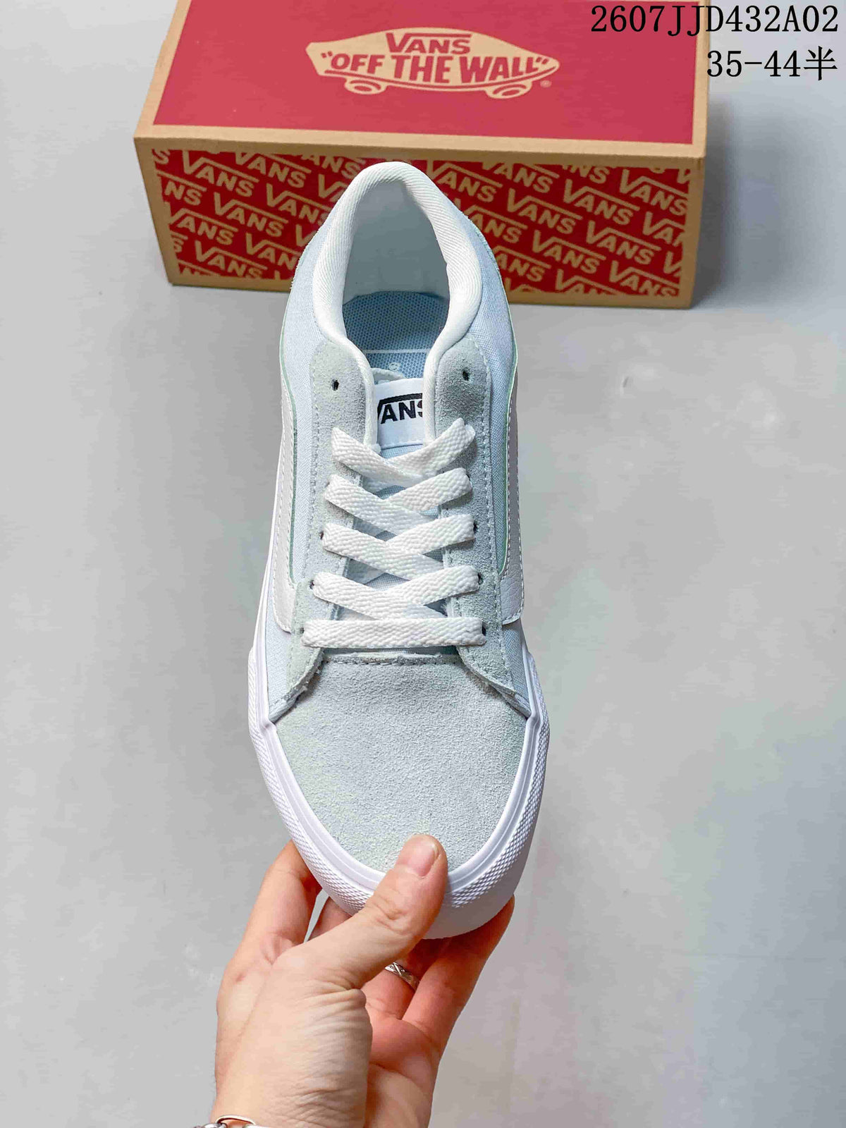 Front view of the sneaker showing its laces, toe panel, and low-top shape.
