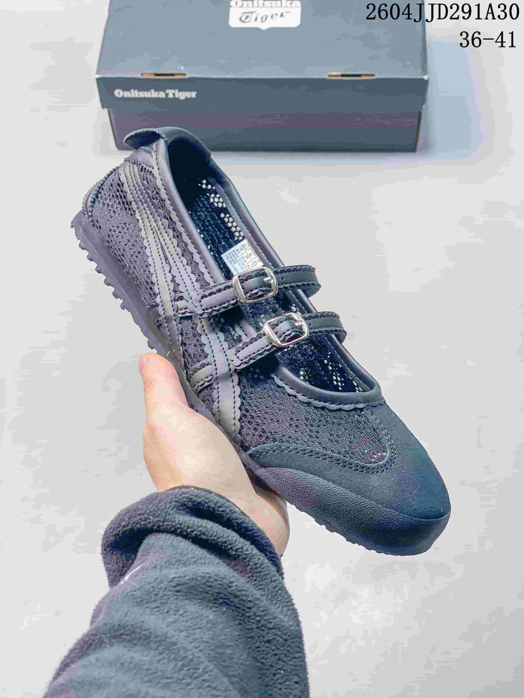 Dark navy sneaker shown from above with buckle straps