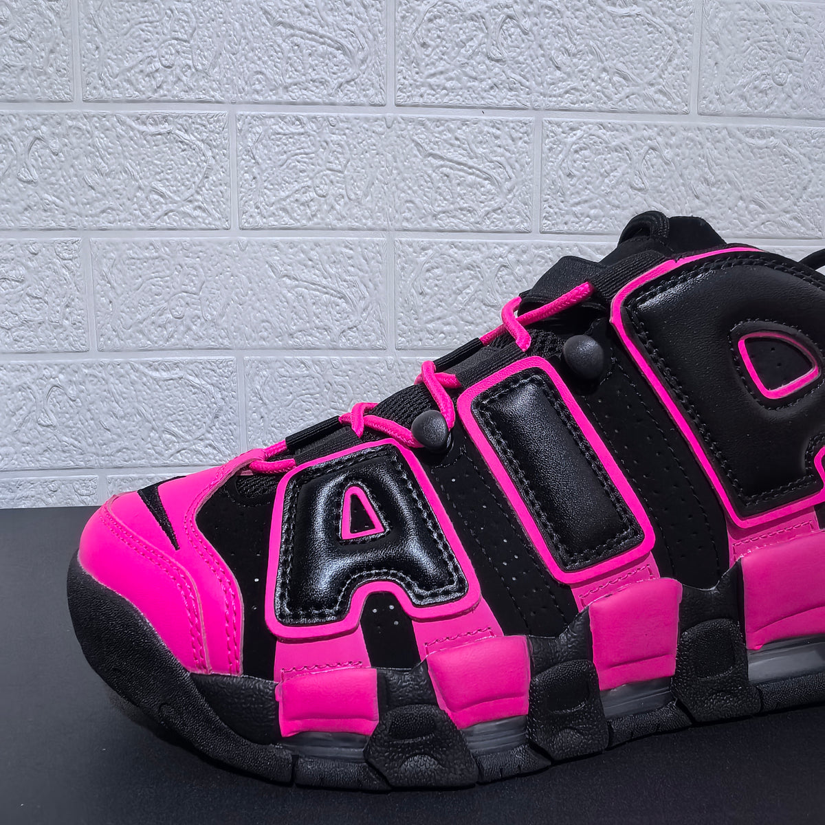 Close-up of the pink laces and oversized AIR lettering