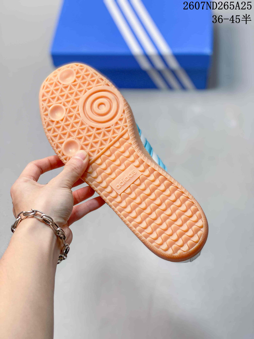 Close-up of the gum-colored rubber outsole showing its textured tread pattern.