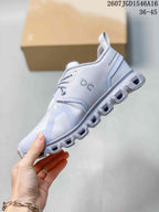 Side profile of the sneaker showing the mesh-like upper, lace system, side branding and segmented sole.