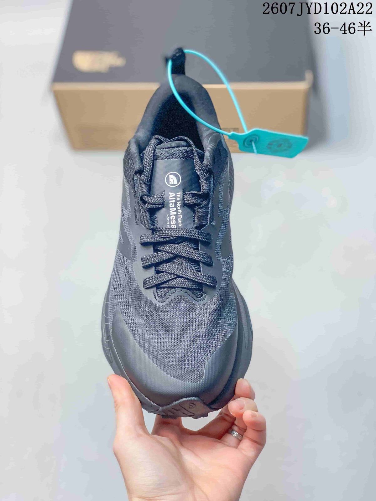 Top view of the dark gray lace-up sneaker with the Altamesa 500 tongue label visible.