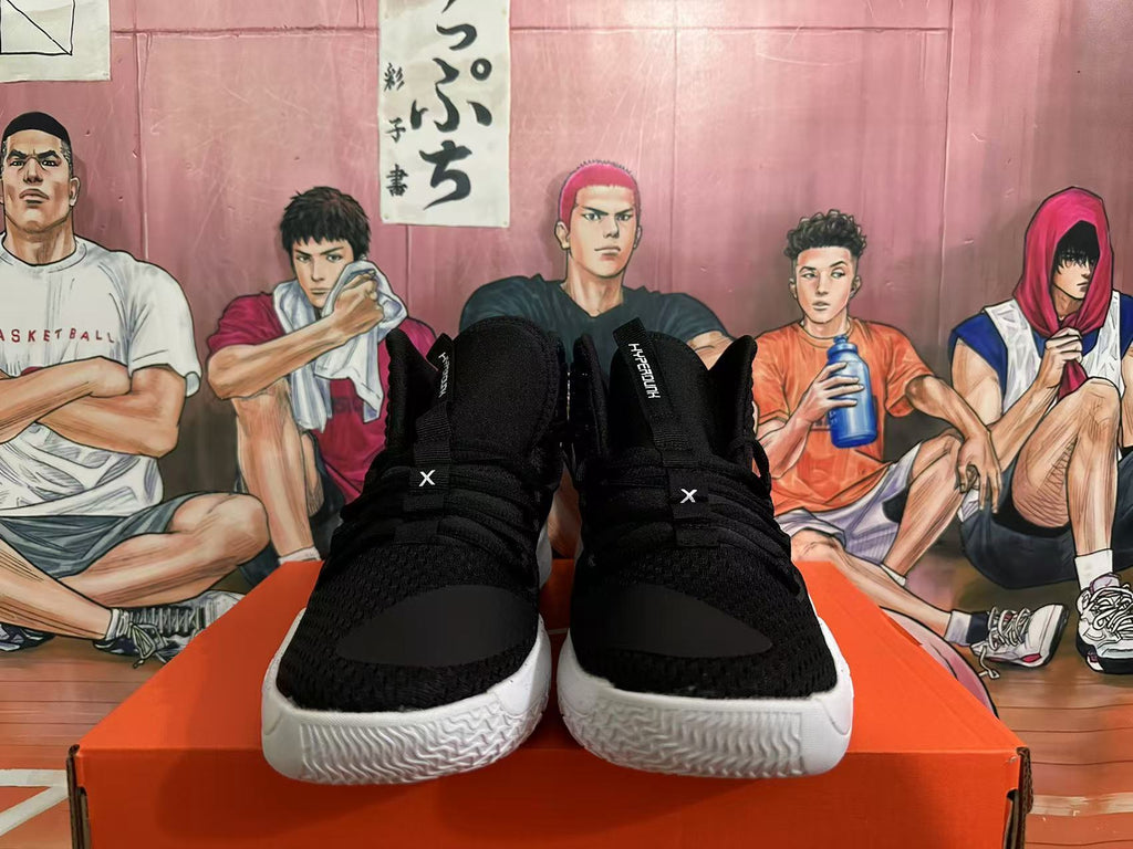 Front view showing black laces and textured light-colored outsoles
