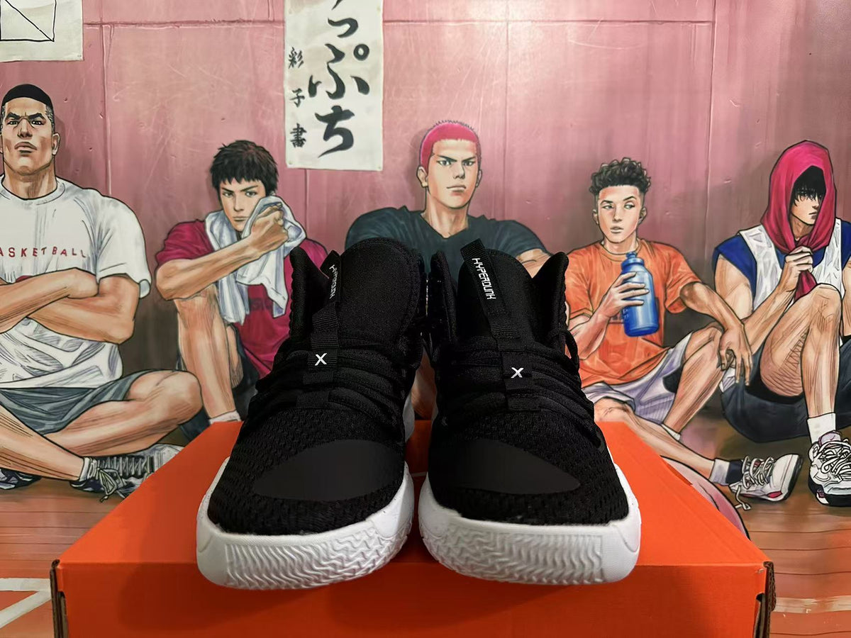 Front view showing black laces and textured light-colored outsoles