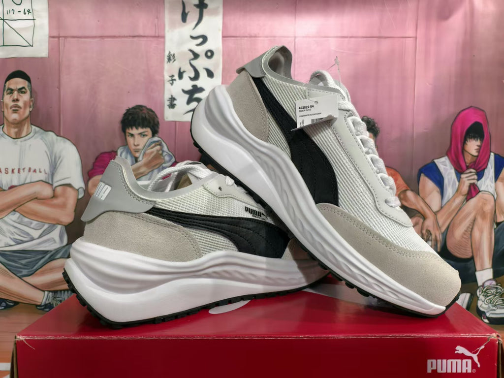 PUMA sneakers displayed from the side, with a visible shoe label