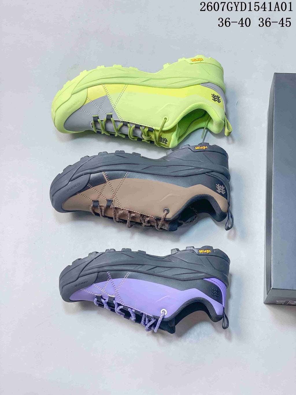Side views of the brown, lime green, and purple Kolon Sport sneakers