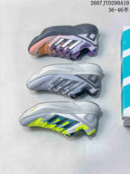 Three adidas Equipment Adios Pro colorways arranged from above, including gray and lime, gray, and purple-orange.