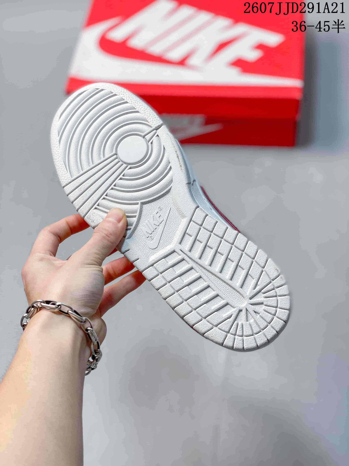 Bottom view showing the textured white rubber outsole with circular and block tread sections.